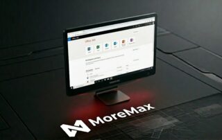 A professional computer monitor with the MoreMax logo, representing IT as a secure and always-on business utility for law firms.